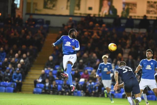 Posh striker Junior Morias sends a header goalwards in the 4-1 defeat by Southend. Photo: David Lowndes.