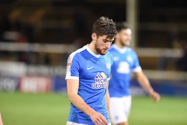 Posh skipper Jack Baldwin is down in the dumps after the 4-1 defeat by Southend. Photo: David Lowndes.