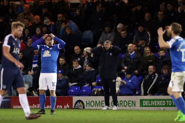 The third Southend goal is greeted with disbelief by Posh manager Grant McCann and players Craig Mackail-Smith and Paul Taylor. Photo: Joe Dent/theposh.com.