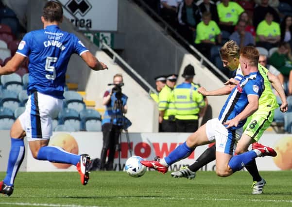 Chris Forrester scores for Posh at Rochdale on the opening day of the League One season in August.