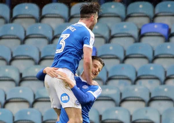 Tom Nichols is joined oin his goal celebrations by Posh team-mate Andrew Hughes. Photo: Joe Dent/theposh.com.