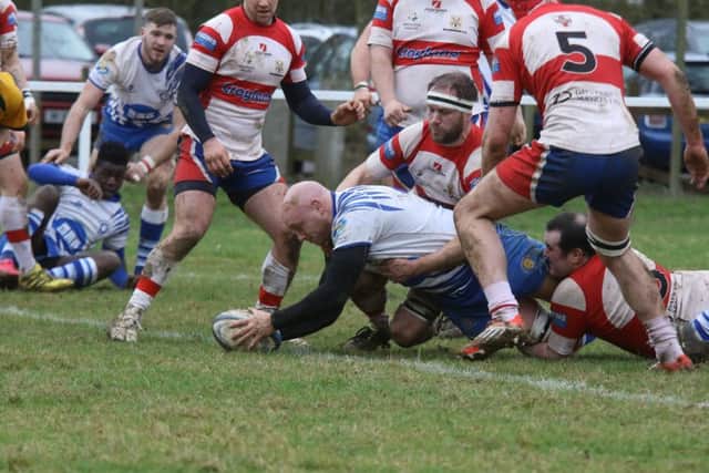 Pete Kolakowski scores the first of his two tries against Wellingborough. Picture: Mick Sutterby