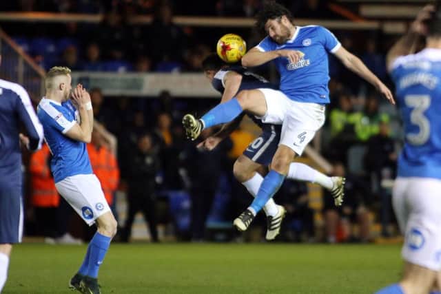 Michael Bostwick is expected to play at centre-back for Posh at Millwall.