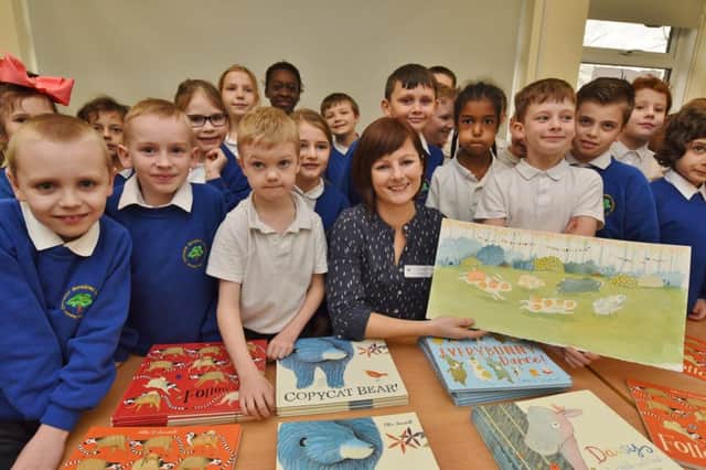 Children's author Ellie Sandall with year 3 and 4 pupils at Orton Meadows Academy during book week EMN-170227-191934009