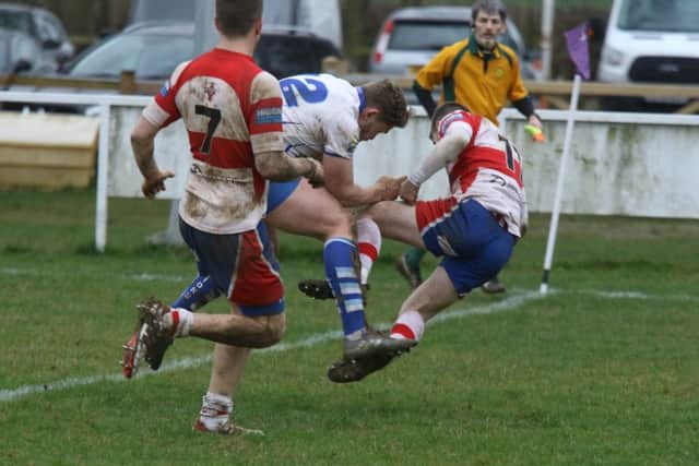 Will Carrington scores a try against Wellingborough. Picture: Mick Sutterby