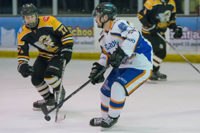 The Islanders in action.