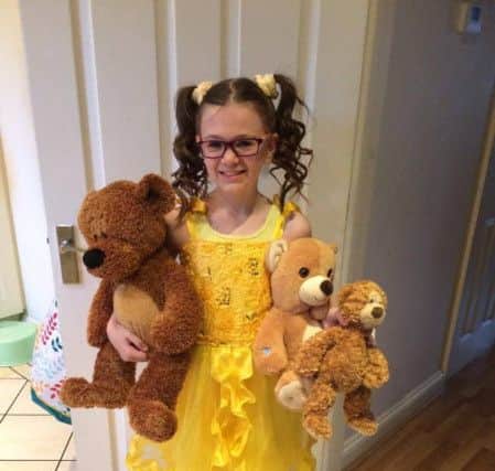 Donna Duffy sent  us this photo of her daughter Evelyn from Eye Primary School dressed as Goldilocks with her 3 bears!