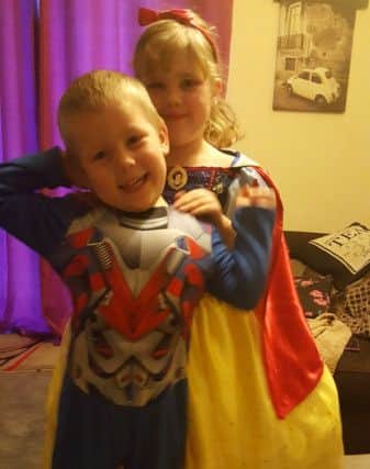 Eleanor and Logan Wilson from Deeping St James County Primary as Bumble Bee and Snow White.