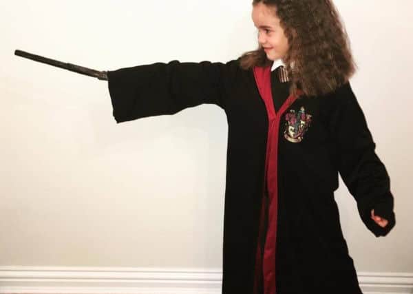 Ava Eaton, 6, from Newborough Primary School as Hermoine from Harry Potter