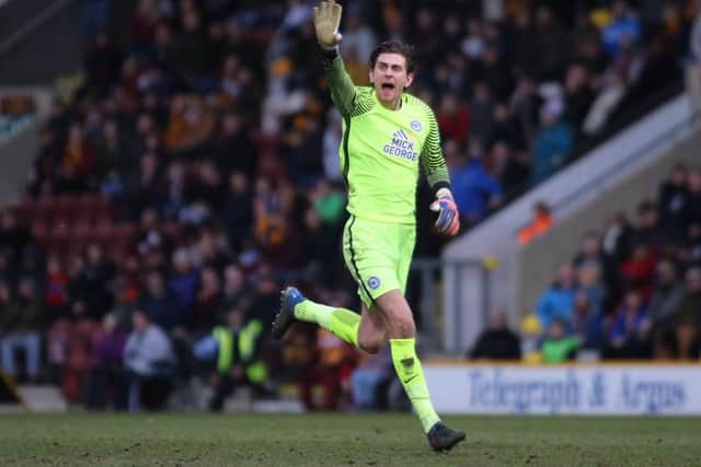 Posh goalkeeper Luke McGee sprints upfield for a late set-piece. Photo: Joe Dent/theposh.com.