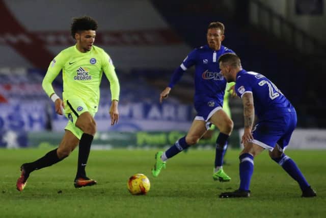 Lee Angol in action for Posh at Oldham.