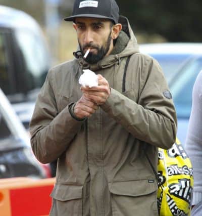 Arun Ali leaving Peterborough Magistrates Court.
Picture by Terry Harris. THA