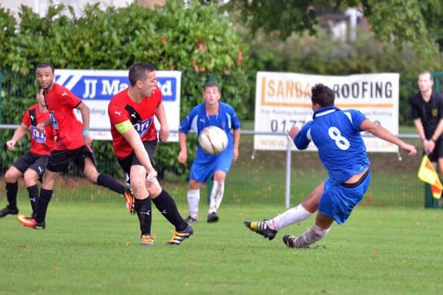 Action from a Bourne game at the Abbey Lawns earlier this season.