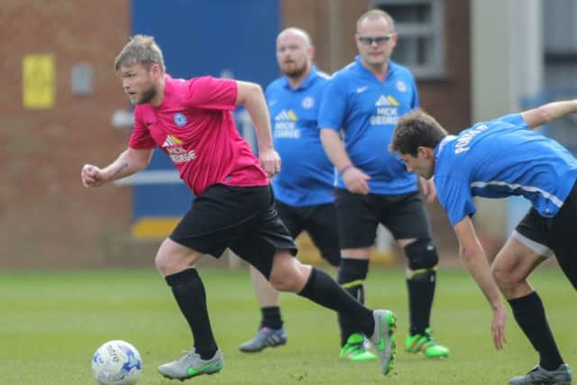 Action from last year's Mick George charity football match.