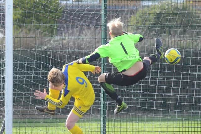 Netherton goalkeeper Ross Ingram in action against Moulton Harrox in the semi final of the President's Shield. Photo: David Lowndes.