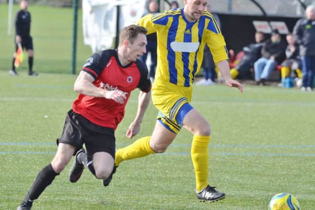 Two-goal Tommy Randall in action for Netherton United against Moulton Harrox. Photo: David Lowndes.