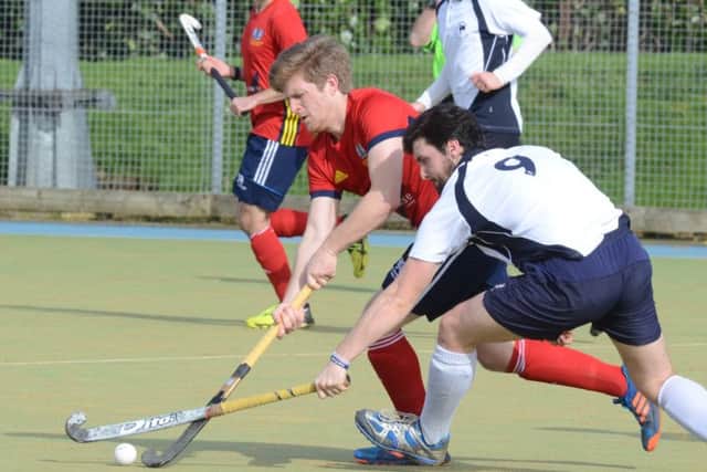 Danny Sisson (red) in action for City of Peterborough against Dereham. Photo: David Lowndes.
