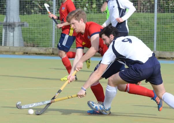 Danny Sisson (red) in action for City of Peterborough against Dereham. Photo: David Lowndes.