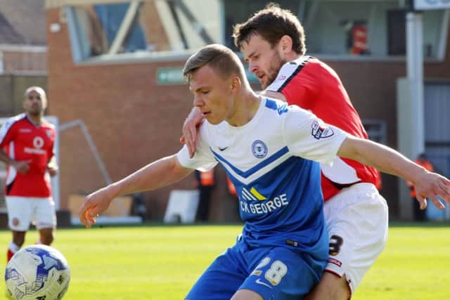 Harry Anderson in action for Posh against Walsall.