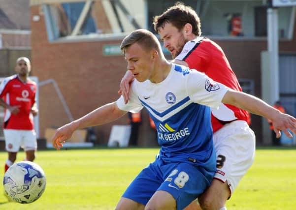 Harry Anderson in action for Posh against Walsall.