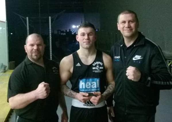 Birthday boy Kieran Cocker pictured with his coaches Mark Dane (left) and Chris Baker.