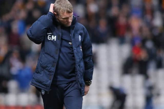 Posh manager Grant McCann has problems to solve