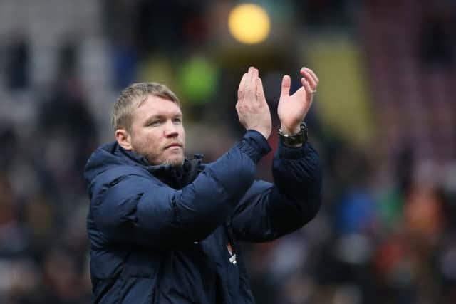 Posh manager Grant McCann fancies his side's chances in their final 10 games.