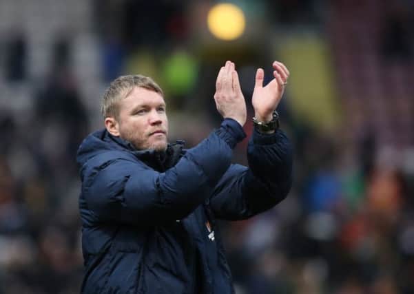 Posh manager Grant McCann fancies his side's chances in their final 10 games.