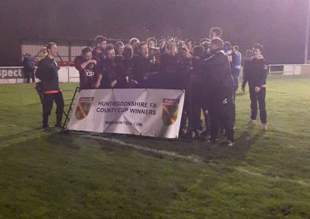 Cardea celebrate their county cup win.