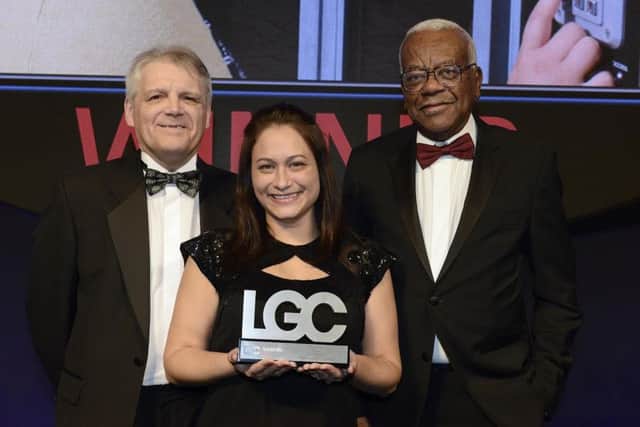 Award winner Lisa Roberts with Sir Trevor McDonald and award judge Steve Atkinson, Former Chief Executive of Hinckley & Bosworth Borough Council