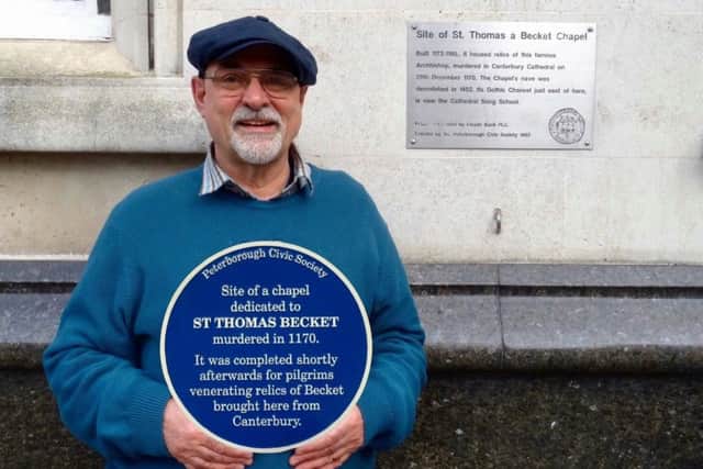 Toby Wood, from Peterborough Civic Society, with one of the new blue plaques.