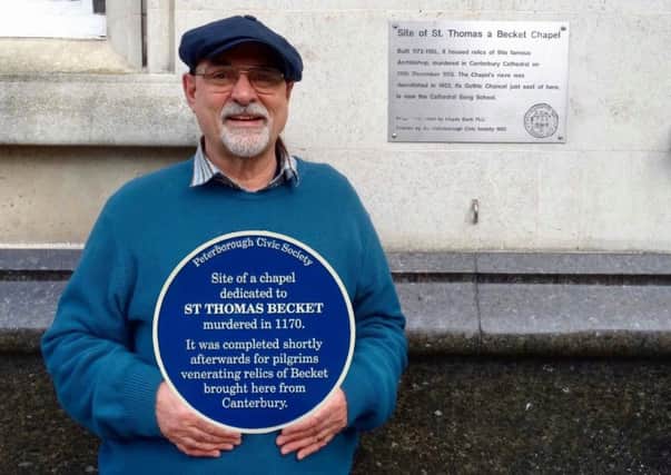 Toby Wood, from Peterborough Civic Society, with one of the new blue plaques.