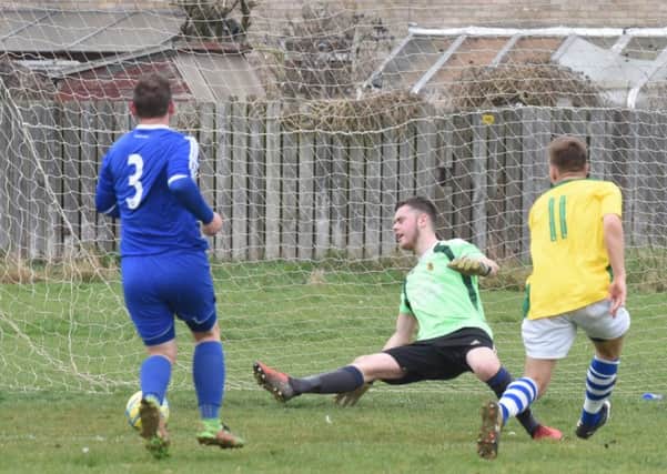 Action from ICA Sports 0, AFC Stanground Sports 2. Photo: David Lowndes.