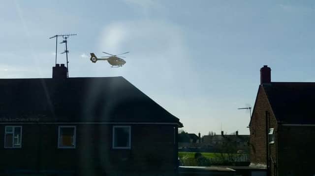 The East Anglian Air Ambulance flies to the scene in Stanground