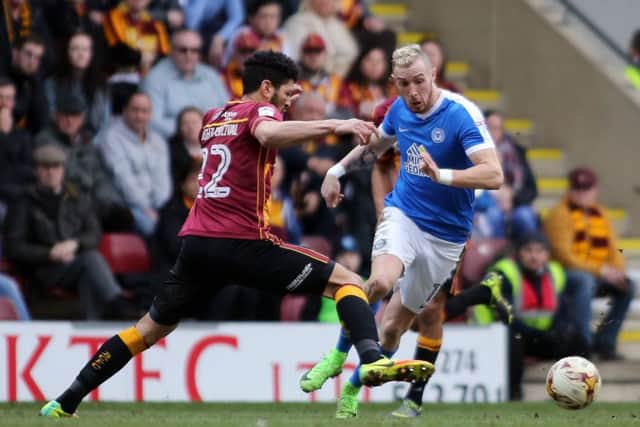 Marcus Maddison is out of the Posh trip to Chesterfield.