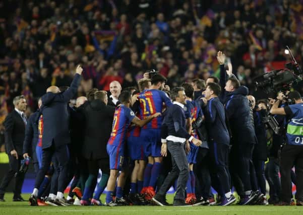 Barcelona celebrate a tawdry win over Paris St Germain.