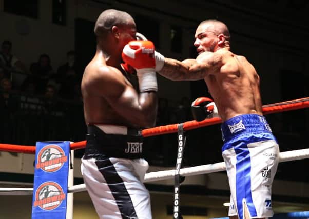 Karl Wheeler (right) in action against Ossie Jervier last October.  Wheeler won on points.