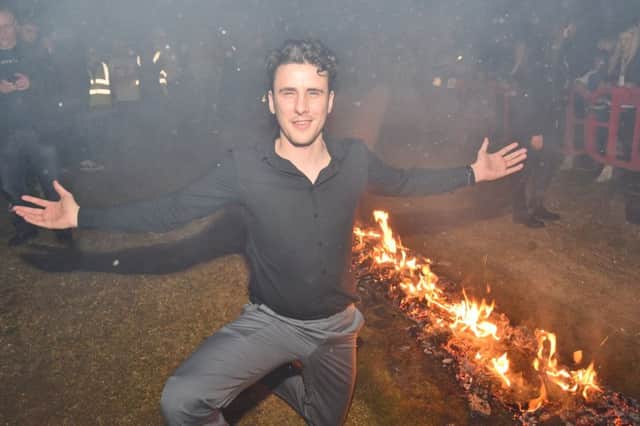 Firewalkers at the Three Horseshoes at Yaxley.  Joseph Valente taking part. EMN-171203-123041009