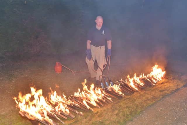 Firewalkers at the Three Horseshoes at Yaxley. EMN-171203-122829009