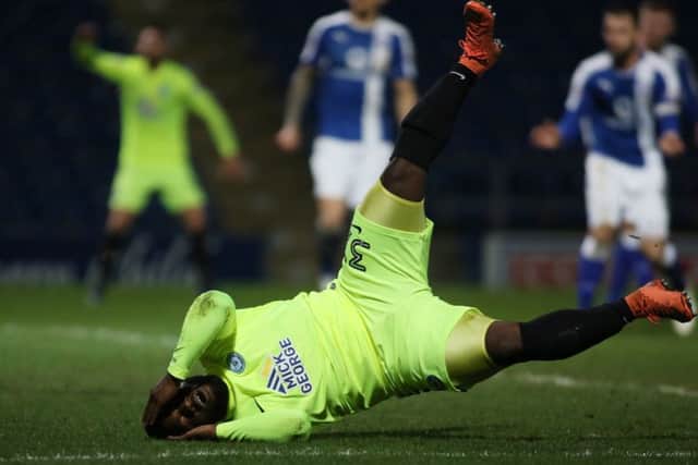 Posh substitute Junior Morias can't believe he's missed a last-minute chance of a winning goal at Chesterfield. Photo: Joe Dent/theposh.com.