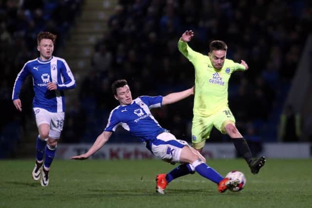 Posh star Paul Taylor skips past a Chesterfield defender. Photo: Joe Dent/theposh.com.