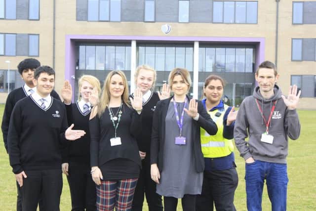 pupils from Stanground Academy with (L-R) Joanna Green from Childrens Social Care, Safeguarding nurse Jade Payne, PCSO Nas Yaseen and Youth Worker Bruce Stancombe.