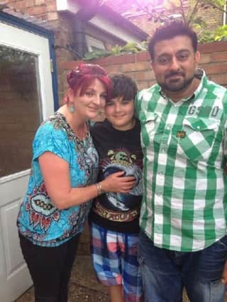 Mohammed Dhanji with wife Nicola and son Zakir