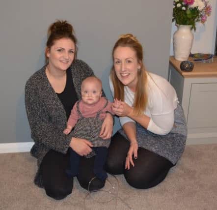 Mum Lauren, left, with cousin Jodie and Ava