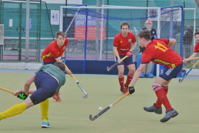 City of Peterborough (red) in action during a 4-4 draw with Letchworth at Bretton Gate. Photo: David Lowndes.