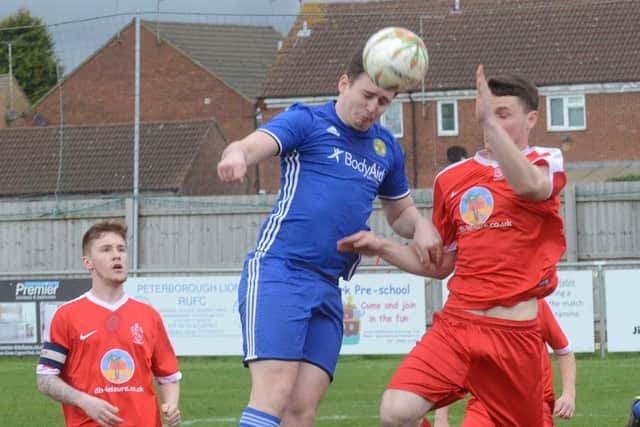 Action from Peterborough Sports' (blue) 4-0 win over Oadby. Photo: David Lowndes.