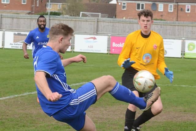 Action from Peterborough Sports (blue) v Oadby at PSL. Photo: David Lowndes.