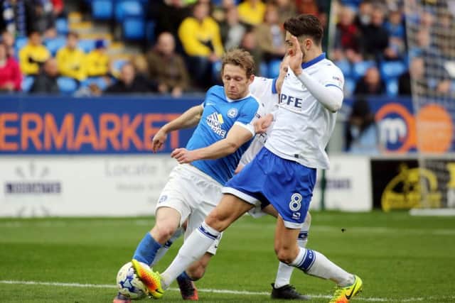Craig Mackail-Smith in action for Posh against Oldham. Photo: Joe Dent/theposh.com.