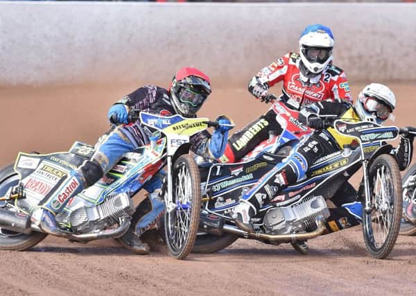 Jack Holder (blue helmet) and Simon Lambert contest the first heat of the year for Panthers against Coventry. Photo: David Lowndes.