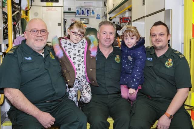 Elisha hills-steedman meets Paramedics that ultimately saved her life after a hit and run. Pictured L2R AdriaN Hobbs,  Elisha, Simon Bryan and Adam Hern.
Peterborough Ambulance Station , Peterborough
20/03/2017. 
Picture by Terry Harris / Peterborough Telegraph. THA